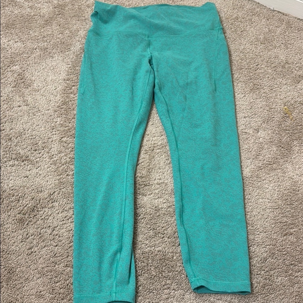 Lululemon Athletica Green Leggings with Wide Waistband and Sleek Finish